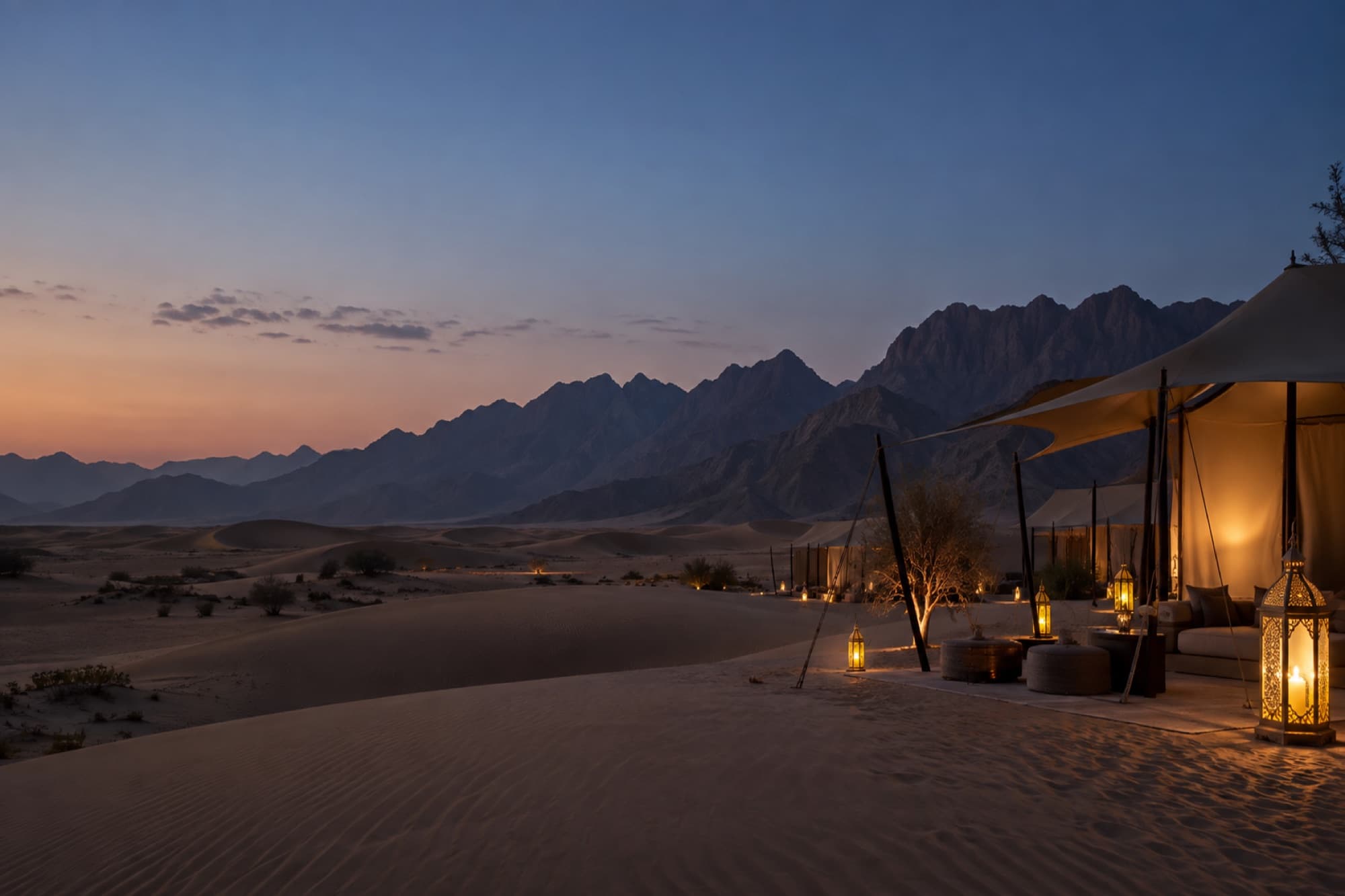 An illustrative desert camp at dusk
